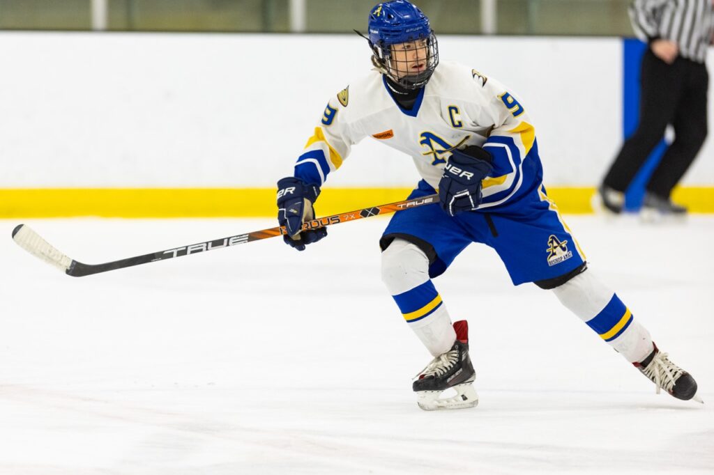 A hockey player skates